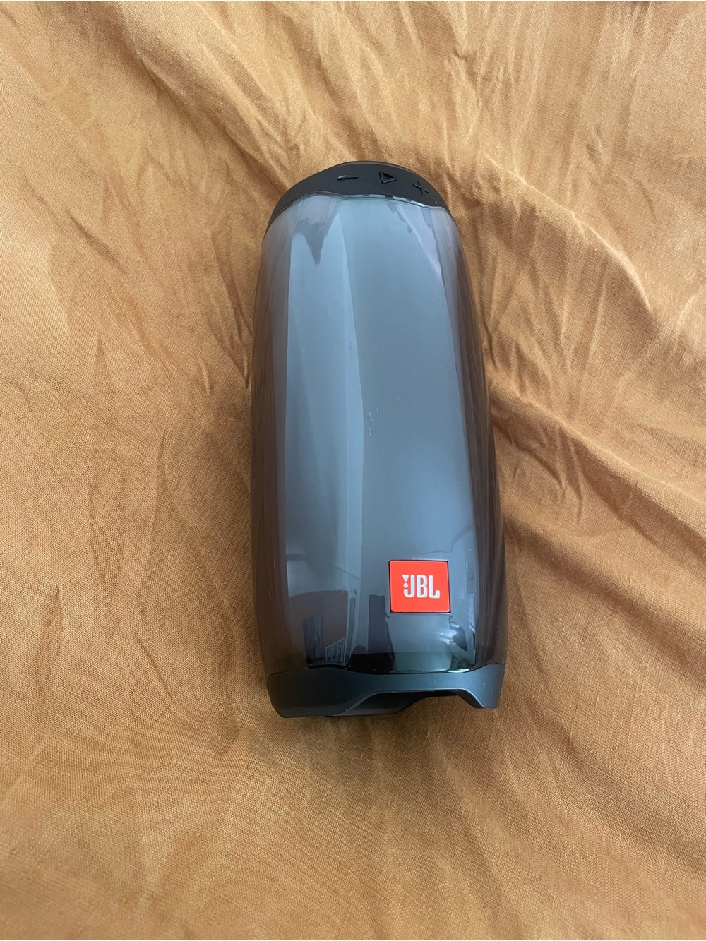 JBL Glossy Smoke Portable Bluetooth Speaker with Red Logo